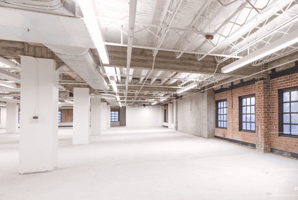 830 K Street creative office interior, exposed brick and ceiling, Sacramento